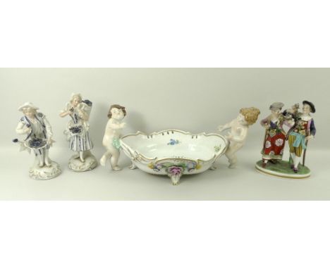 A Volkstedt ceramic figural group, 19th century, of a couple with sticks and flowers, Richard Eckert & Co, 15cm, a pair of Ca