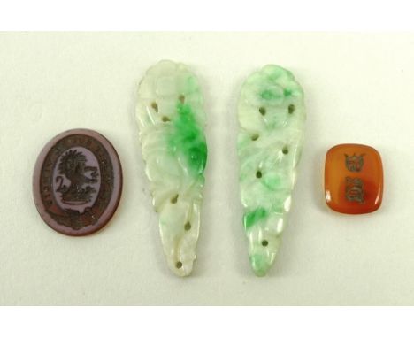 A pair of jade carved and pierced drops, an unmounted intaglio with coronet and lion, and an agate stone with engraved with t