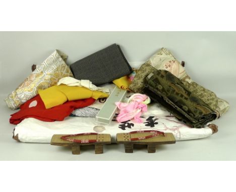 A group of vintage Japanese Kimonos, Obis and accessories, including a silk formal Kimono, the black crepe de chine decorated