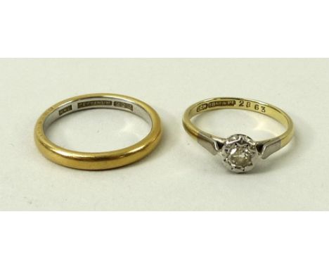 A 22ct gold and platinum wedding band, maker WW Ld, size K / L, 3.5g, and an 18ct gold and platinum diamond ring, illusion se