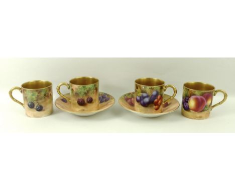 A Royal Worcester collection of four coffee cans and two saucers, decorated with apples, raspberries, blackberries, plums, an