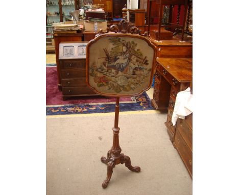 A Victorian walnut pole screen, glazed tapestry and raised wool work panel, raised on a/f cabriole base. 