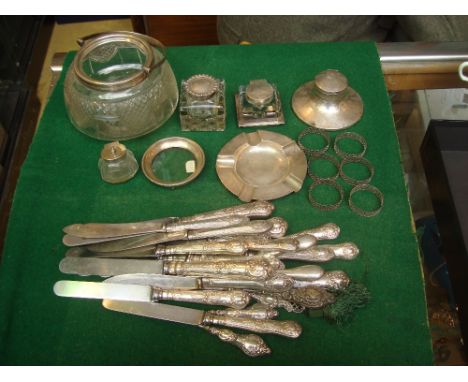 A mixed lot of silver comprising a Capstan inkwell, two other inkwells, an ashtray, a silver mounted glass pin dish, various 