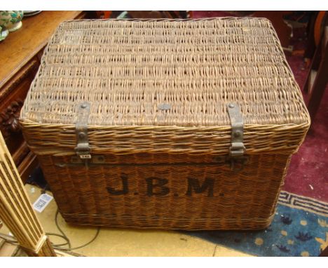 An early 20th Century large wicker laundry hamper, bearing oval metal plaque 'The Sussex Basket Industry Limited, Worthing', 