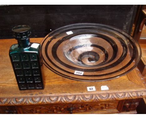 A large glass bowl, poss Whitefriars together with a Whitefriars green glass decanter. 