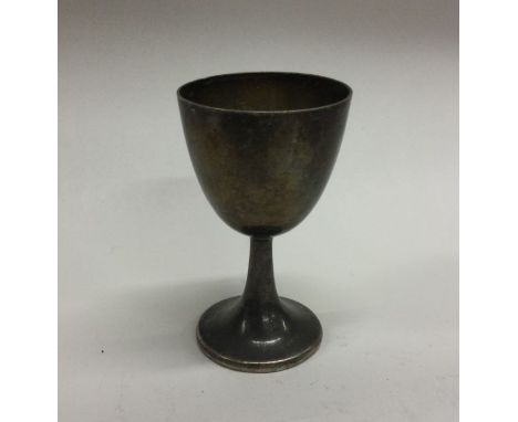 WANG HING: A Chinese silver egg cup. Marked to base. Approx. 38 grams. Est. £30 - £50.