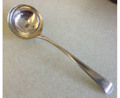 A good Georgian silver ladle. London. By WC. Approx. 46 grams. Est. £20 - £30.