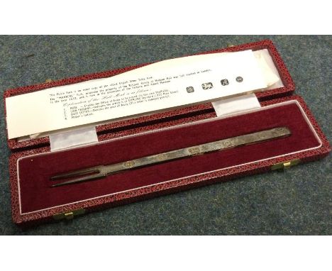 A heavy cased silver pickle fork of tapering form. Approx. 42 grams. Est. £25 - £30.