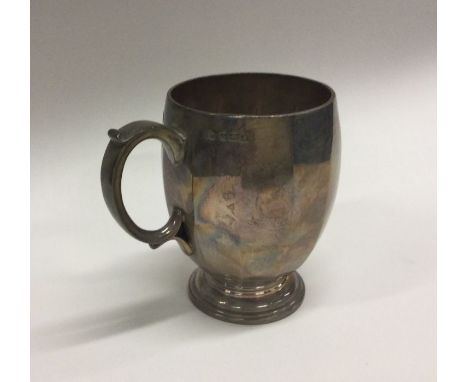 A good quality heavy panelled silver christening cup. Birmingham. By Elkington &amp; Co. Approx. 184 grams. Est. £50 - £80.