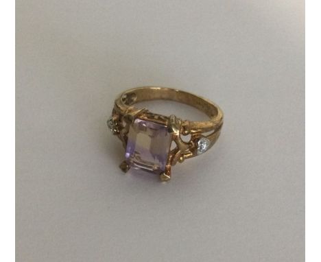 A heavy diamond mounted ring with large central stone set in 9 carat. Approx. 4 grams. Est. £30 - £50.