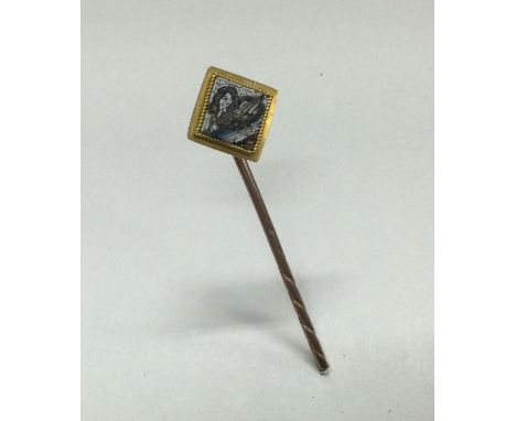 A high carat gold micro-mosaic stick pin depicting a black swan. Approx. 2 grams. Est. £20 - £30.