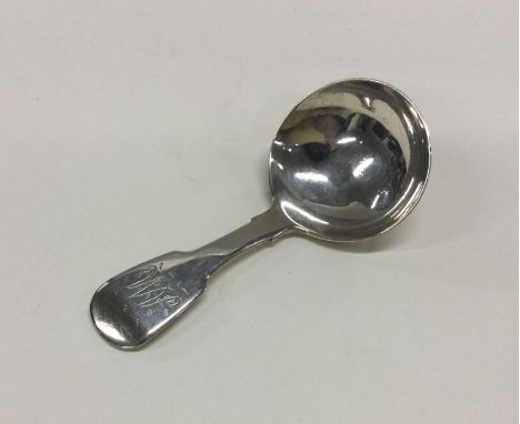 A George III silver caddy spoon. London circa 1820. Approx. 17 grams. Est. £50 - £80.