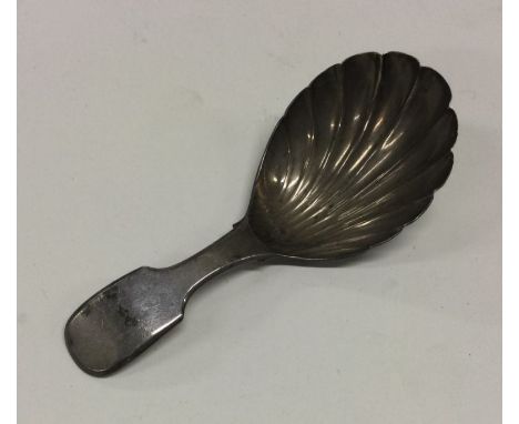 A George III silver caddy spoon. London 1809. By William Eaton. Approx. 14 grams. Est. £50 - £80.