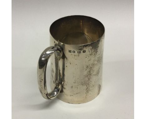A heavy Edwardian tapering silver christening cup. Sheffield. By PKL. Approx. 199 grams. Est. £80 - £120.