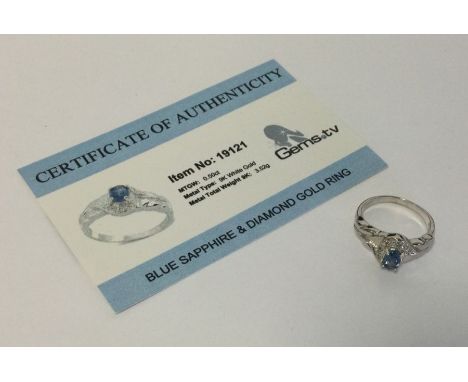 A sapphire and diamond ring set in 9 carat white gold. Approx. 3.52 grams. Est. £25 - £35.