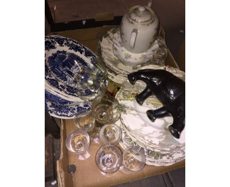 A box including plates, an elephant, glass etc. 
