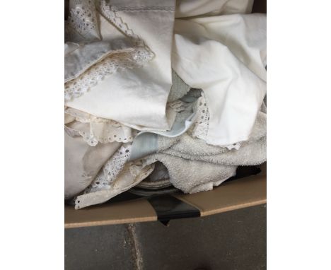 Box of light shades and towels and linen 