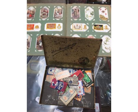Cigarette card album and collection of vintage razor blades 