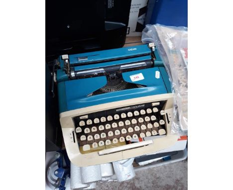 A vintage blue and cream Imperial typewriter. 