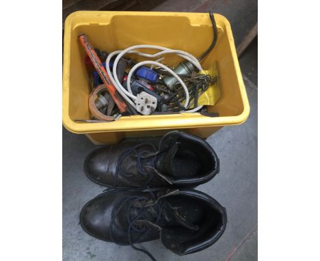 A box of tools and pair of working boots 