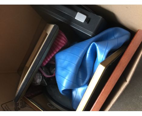 A box of 2 gym balls, vintage portable typewritter, steam iron, etc 