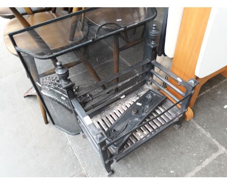 A fire grate complete with a back plate and fire guard 