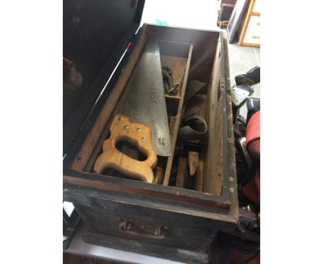 A wooden chest of tools 