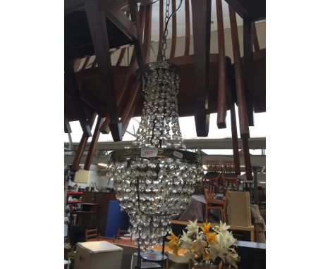 A glass drop light fitting. 