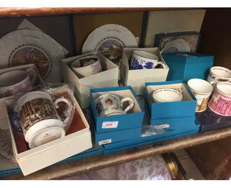 Shelf of commemorative china 