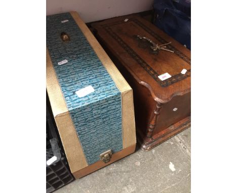 A vintage sewing machine and another 