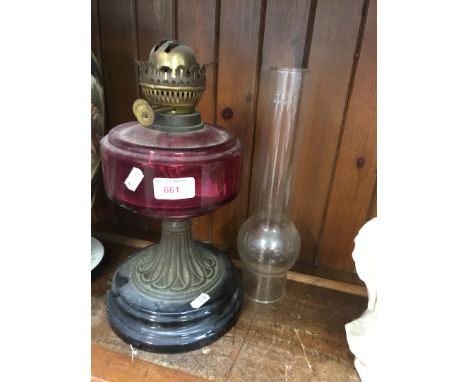 A glass oil lamp 