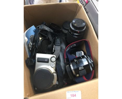 Box of camera equipment, Canon, Minolta and lenses 