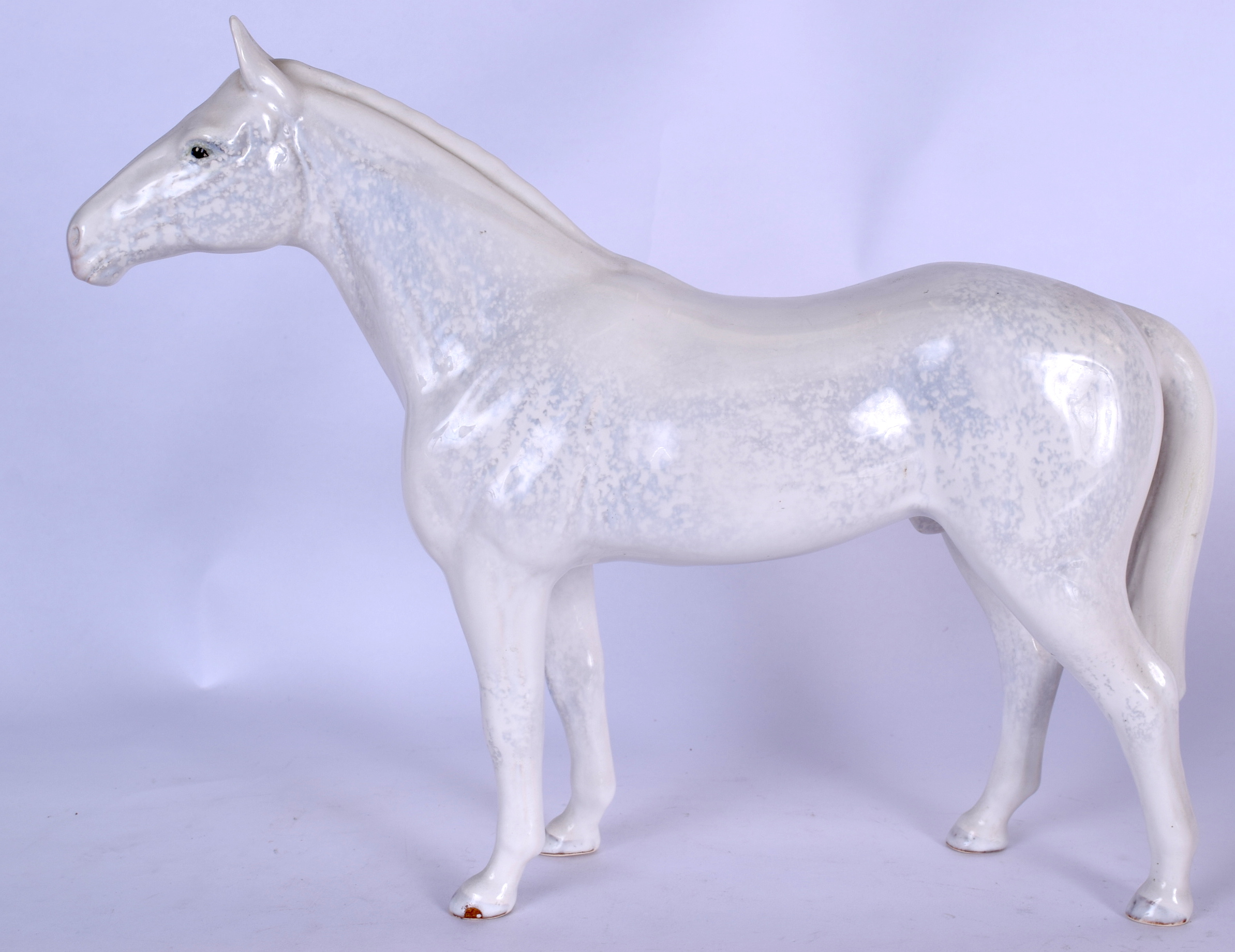 A LARGE SYLVAC PORCELAIN FIGURINE OF A HORSE, modelled standing. 35 cm