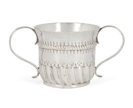 A George II silver porringer, London, 1736, James Manners, with twin handles to half-lobed body and a corded band beneath sli