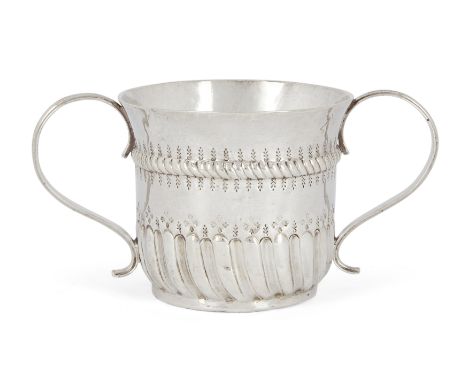 A George II silver porringer, London, 1736, James Manners, with twin handles to half-lobed body and a corded band beneath sli