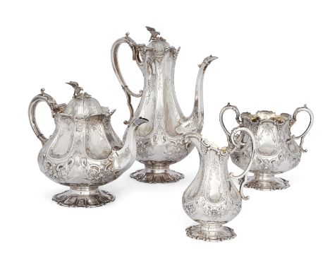 A Victorian silver four piece tea set, London, 1874, Martin Hall & Co., comprising tea pot, coffee pot, sugar and milk jug, o