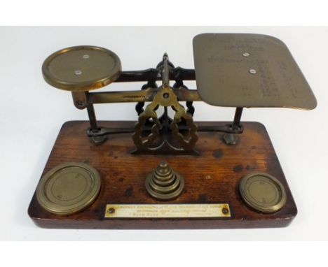 An oak set of postal scales and weights 