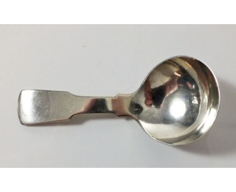 A silver fiddle pattern caddy spoon, Birmingham 1830, by Unite &amp; Hilliard 