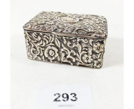 A silver embossed stamp box, Birmingham 1903, 7cm wide by Cohen &amp; Charles