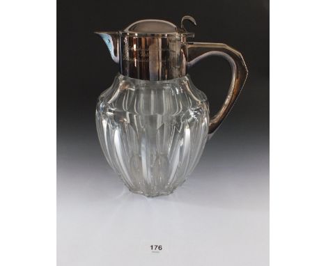 A large German silver plated cut glass jug with hinged lid, with German inscription, 27cm 