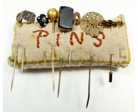 Nine various antique and later stick pins 