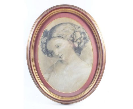 A 19th century charcoal and chalk portrait of a young girl in its original frame (Headrow Gallery Leeds label Verso) 24 x 33c