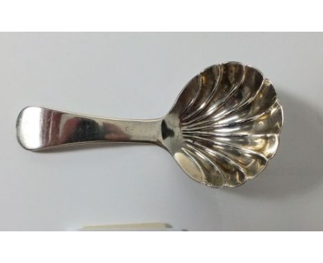 A silver shell bowl caddy spoon, Birmingham 1824, by Joseph Willmore 