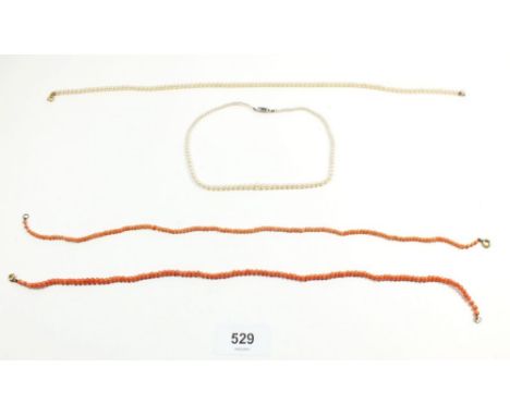 Two antique coral bead necklaces and two seed pearl necklaces 