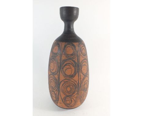 A 1960's terracotta lamp base with black decoration, 42cm