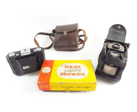A Brownie six-20 folding camera boxed, a Zeiss Ikon Telma camera cased and an Ensign Ful-Vue camera 