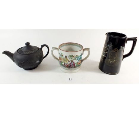 A Victorian two handled cup 'Pekin' by Thomas Booth &amp; Co, a black Victorian commemorative jug and a Wedgwood basalt tea p