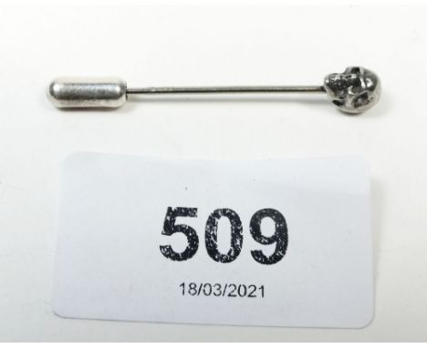 A miniature white metal stick pin with skull finial, 4.4cm 