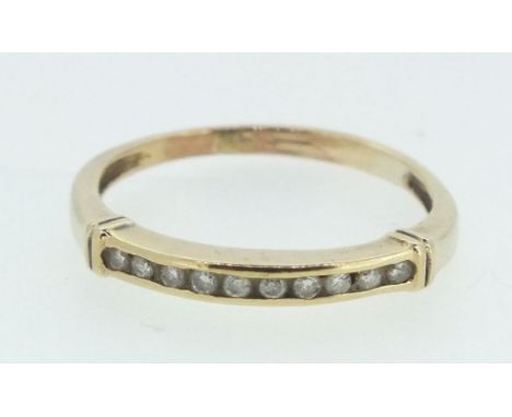 A 9 carat gold ring inset diamonds (unmarked), size M - 1.4g 