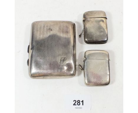 Two silver vesta cases Birmingham 1912 &amp; 1914 and a silver cigarette case, total weight 140g, 